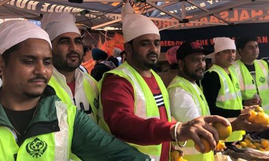 image of masha ail at farmer protest