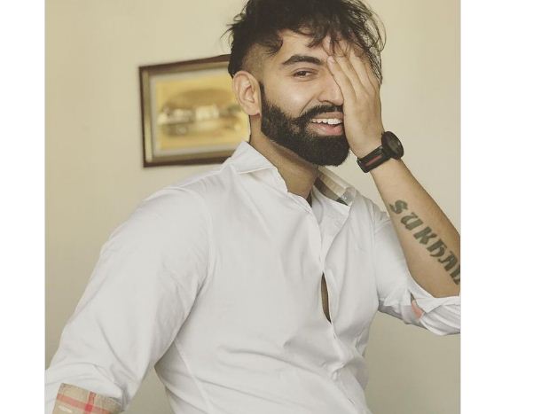 inside image of parmish verma with his tattoo