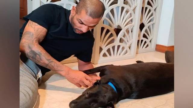 inside image of shikhar dhawan with doggy